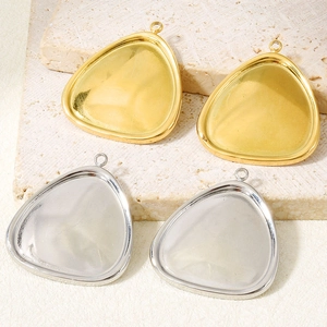 Macro detail of teardrop-shaped 304 stainless steel pendant trays for DIY jewelry making