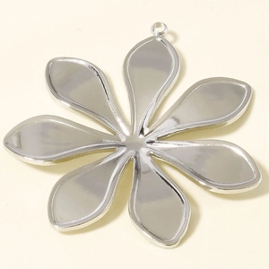 Detailed macro view of silver 7-petal flower pendant tray for handmade jewelry DIY making