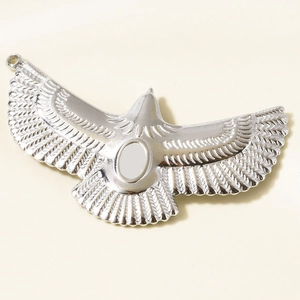 Macro shot of silver 304 stainless steel bird pendant with detailed wing textures