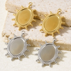 Detail of sunburst pendant bases in gold and silver for DIY jewelry making