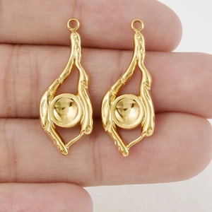 Pair of organic 304 stainless steel abstract eye pendants with golden finish for DIY