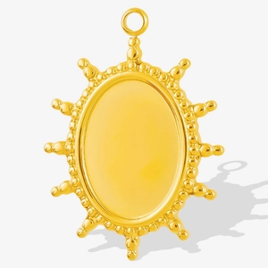 Detailed view of oval sunburst pendant with golden finish for DIY jewelry making