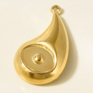 Detailed close-up of a gold teardrop pendant with a central dome for jewelry making
