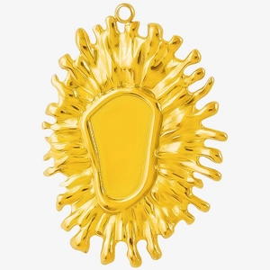 Macro detail of golden irregular floral pendant with polished finish and open setting center