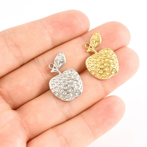 Détail des breloques pomme en acier 304 avec surface texturée en nid d'abeille