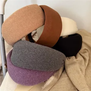 Serre-têtes épais en tissu rembourré aux tons terreux pour un look volumineux