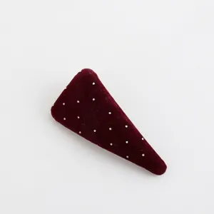 Cute burgundy velvet triangular hair clip with white polka dots for women styling