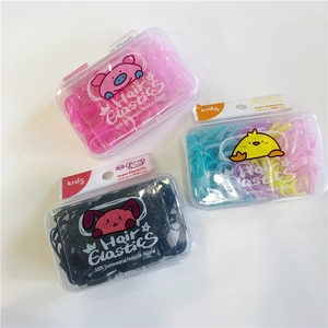 Kids elastic hair bands in transparent boxes featuring cute cartoon animal designs