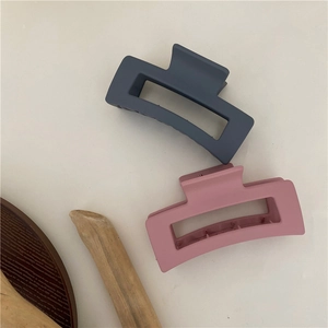 Minimalist matte rectangular hair claws in navy blue and dusty pink resin
