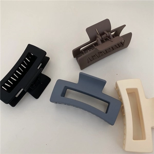 Matte rectangular hollow hair claws in black, coffee, blue, and cream white 4-pack set