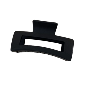 Matte black rectangular hollow hair claw clip with minimalist geometric design for women