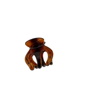 Medium amber tortoiseshell shark hair claw clip for women in elegant resin style
