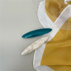 Minimalist marble pattern resin hair clips in dark cyan and cream white, two-piece set
