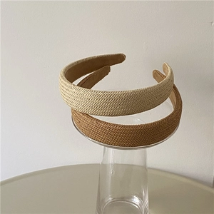Minimalist woven headband set in beige and caramel brown with non-slip lining