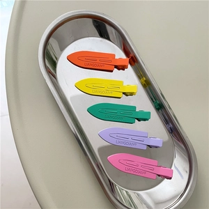 5-piece set of neon matte hair clips in orange yellow green purple and pink tones