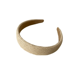 Minimalist beige woven headband for women with natural straw texture and fabric lining