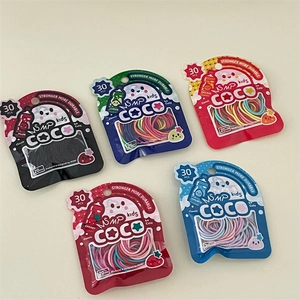 Dettaglio di 30 elastici per capelli colorati da 20mm in confezione a tema frutta