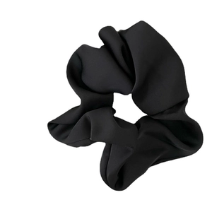 Minimalist black satin scrunchie for women with elegant pleated fabric design