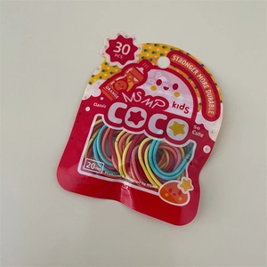 Dettaglio di 30 elastici per capelli colorati da 20mm per bambini in colori macaron