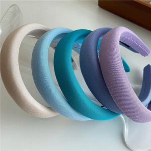 Thickened sponge headbands in cream and blue tones with textured fabric finish