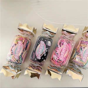 Cute colorful hair ties set in creative candy-shaped boxes for girls hair styling
