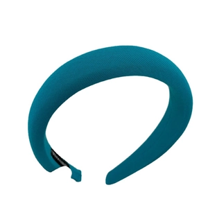 Padded blue knit headband for women featuring a thick sponge design and ribbed fabric