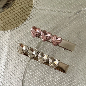 Fermagli per capelli in metallo argento con cuori di cristallo rosa e trasparente chic