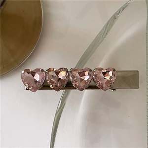 Macro di fermaglio per capelli argento con quattro cristalli rosa a forma di cuore
