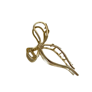 Elegante molletta per capelli in metallo dorato con fiocco e trama a rametto