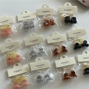 Set of colorful jelly hair clips with mini bow and flower designs on display cards