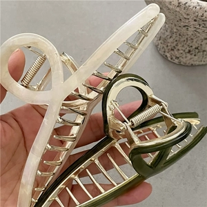Elegant 14cm acetate hair claw clips in marble white and deep green with gold metal accents