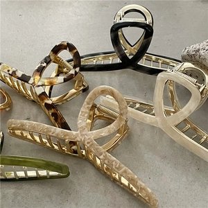 Elegant 14cm acetate alloy hair claw clips in tortoise and marble patterns