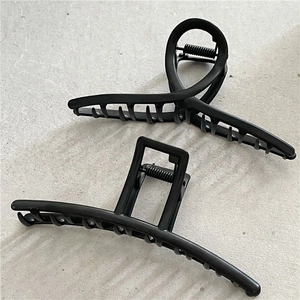 Set of two matte black geometric hair claws with cross and square minimalist design