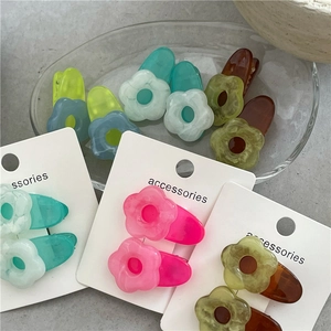 Colorful floral jelly hair clips for girls featuring resin flower petals and sleek finish