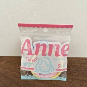 Close-up of 5-piece macaron color hair elastics in transparent brand packaging