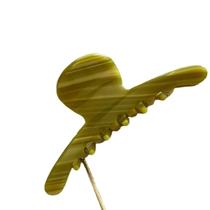 Minimalist acetate hair claw clip with olive green marble pattern for women's hairstyles