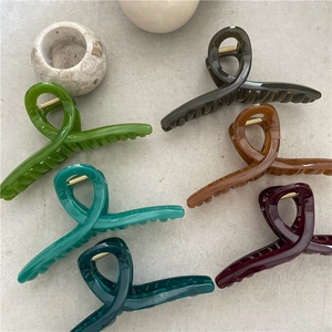 Set of six large jelly texture cross claw clips in multiple vibrant colors for women