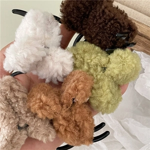 Plush lamb wool hair claws in various colors for high ponytail styling and winter wear