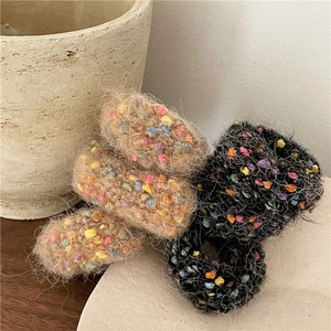 Plush knitted donut hair ties with colorful dots in soft brown and black set