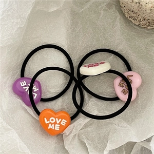 Cute heart-shaped LOVE hair ties set in colorful acrylic for women and girls