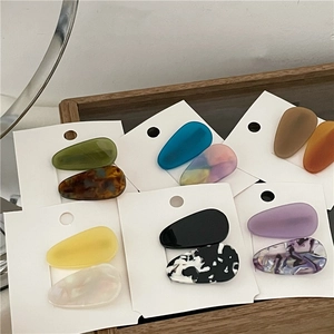 Set of 2 minimalist acrylic water drop hair clips with acetate texture on card