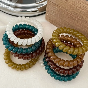 Elastic spiral telephone wire hair ties in dark jelly autumn colors for women