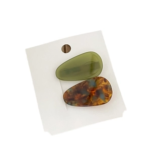 Set of two teardrop acetate hair clips in olive green and tortoise shell pattern