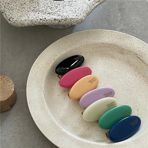 Colorful French style handmade oval hair clips in seven bright enamel finishes