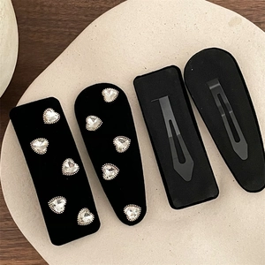 Elegant 4-piece black velvet BB hair clips set with sparkling heart rhinestones