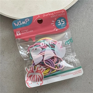 Detail of 35pcs pack of colorful candy-colored elastic hair ties in transparent bag