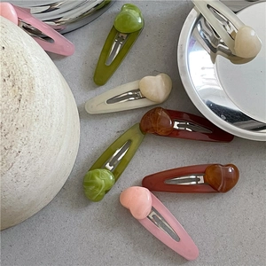 Cute colorful heart resin hair clips set with jelly texture on grey background