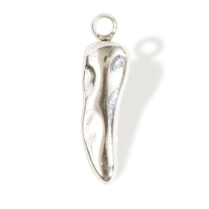 Macro shot of polished silver 304 stainless steel chili pendant with a smooth mirror finish