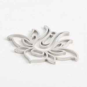 Detailed close-up of 304 stainless steel lotus pendant with hollow petals and brushed finish