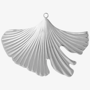 Macro shot of silver 304 stainless steel ginkgo leaf pendant with detailed radial texture